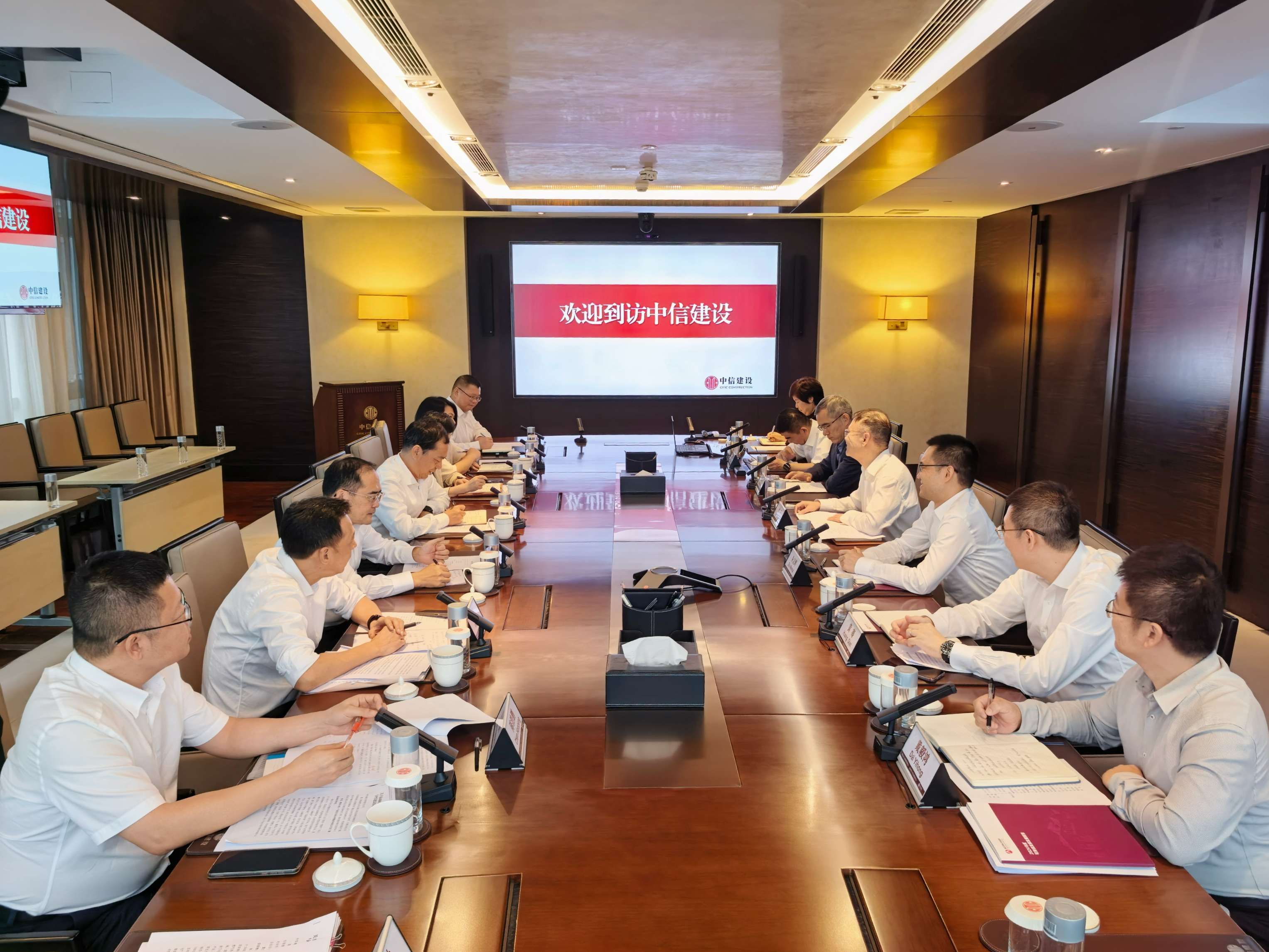 萬義輝董事長率隊赴中信建設開展業務對接